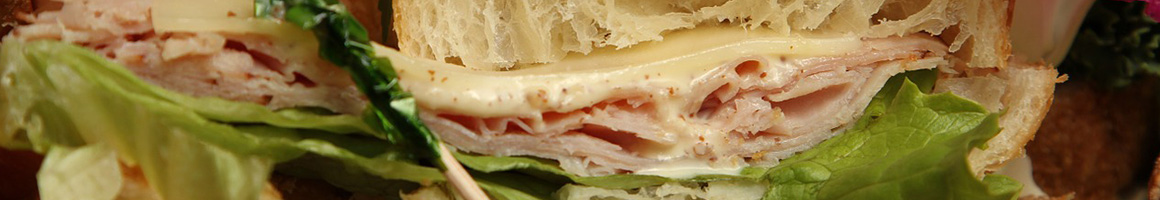 Eating Sandwich at Village Bake House Niantic restaurant in Niantic, CT.